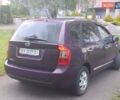 Фіолетовий Кіа Каренс, об'ємом двигуна 2 л та пробігом 209 тис. км за 6900 $, фото 1 на Automoto.ua