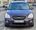 Фиолетовый Киа Каренс, объемом двигателя 2 л и пробегом 180 тыс. км за 6400 $, фото 4 на Automoto.ua