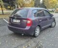 Фиолетовый Киа Каренс, объемом двигателя 1.99 л и пробегом 242 тыс. км за 5200 $, фото 3 на Automoto.ua