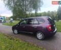 Фіолетовий Кіа Каренс, об'ємом двигуна 2 л та пробігом 209 тис. км за 6900 $, фото 13 на Automoto.ua