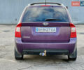Фиолетовый Киа Каренс, объемом двигателя 2 л и пробегом 180 тыс. км за 6400 $, фото 6 на Automoto.ua