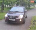Фиолетовый Киа Каренс, объемом двигателя 2 л и пробегом 209 тыс. км за 7500 $, фото 25 на Automoto.ua