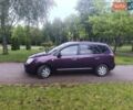 Фиолетовый Киа Каренс, объемом двигателя 2 л и пробегом 209 тыс. км за 7500 $, фото 1 на Automoto.ua
