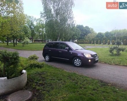 Фіолетовий Кіа Каренс, об'ємом двигуна 2 л та пробігом 209 тис. км за 6900 $, фото 11 на Automoto.ua