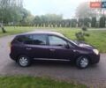 Фиолетовый Киа Каренс, объемом двигателя 2 л и пробегом 209 тыс. км за 7500 $, фото 15 на Automoto.ua
