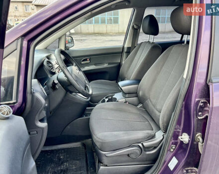 Фиолетовый Киа Каренс, объемом двигателя 2 л и пробегом 180 тыс. км за 6400 $, фото 11 на Automoto.ua