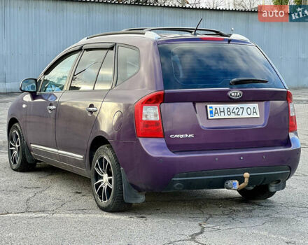 Фиолетовый Киа Каренс, объемом двигателя 2 л и пробегом 180 тыс. км за 6400 $, фото 7 на Automoto.ua