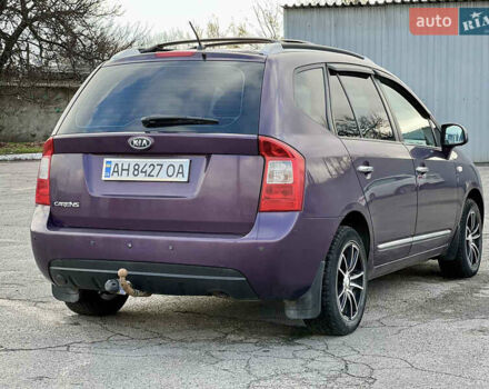 Фиолетовый Киа Каренс, объемом двигателя 2 л и пробегом 180 тыс. км за 6400 $, фото 3 на Automoto.ua
