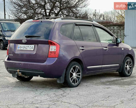 Фиолетовый Киа Каренс, объемом двигателя 2 л и пробегом 180 тыс. км за 6400 $, фото 2 на Automoto.ua