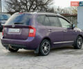 Фиолетовый Киа Каренс, объемом двигателя 2 л и пробегом 180 тыс. км за 6400 $, фото 2 на Automoto.ua