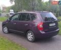 Фіолетовий Кіа Каренс, об'ємом двигуна 2 л та пробігом 209 тис. км за 6900 $, фото 8 на Automoto.ua