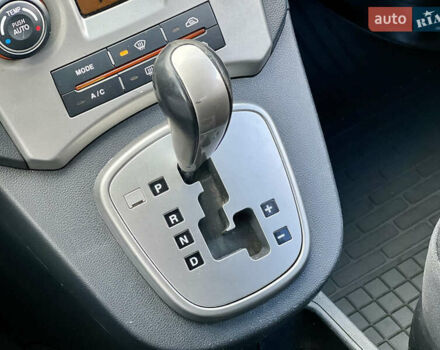 Фиолетовый Киа Каренс, объемом двигателя 2 л и пробегом 180 тыс. км за 6400 $, фото 13 на Automoto.ua