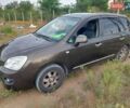 Коричневый Киа Каренс, объемом двигателя 2 л и пробегом 269 тыс. км за 6400 $, фото 12 на Automoto.ua