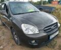 Коричневый Киа Каренс, объемом двигателя 2 л и пробегом 269 тыс. км за 6400 $, фото 1 на Automoto.ua