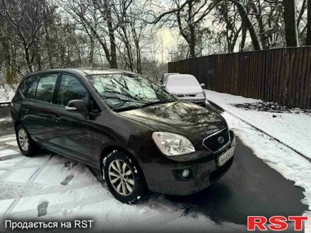 Коричневый Киа Каренс, объемом двигателя 2 л и пробегом 144 тыс. км за 8500 $, фото 1 на Automoto.ua