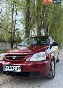 Красный Киа Каренс, объемом двигателя 2 л и пробегом 319 тыс. км за 4500 $, фото 1 на Automoto.ua