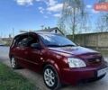 Красный Киа Каренс, объемом двигателя 2 л и пробегом 319 тыс. км за 4500 $, фото 4 на Automoto.ua