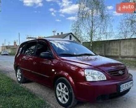 Красный Киа Каренс, объемом двигателя 2 л и пробегом 319 тыс. км за 4500 $, фото 3 на Automoto.ua