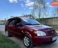 Красный Киа Каренс, объемом двигателя 2 л и пробегом 319 тыс. км за 4500 $, фото 3 на Automoto.ua