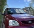 Красный Киа Каренс, объемом двигателя 2 л и пробегом 319 тыс. км за 4500 $, фото 3 на Automoto.ua