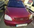 Красный Киа Каренс, объемом двигателя 1.99 л и пробегом 350 тыс. км за 4500 $, фото 1 на Automoto.ua