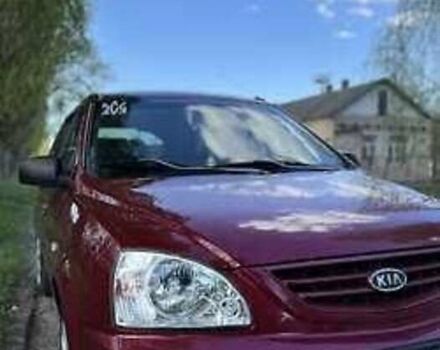 Красный Киа Каренс, объемом двигателя 2 л и пробегом 319 тыс. км за 4500 $, фото 2 на Automoto.ua