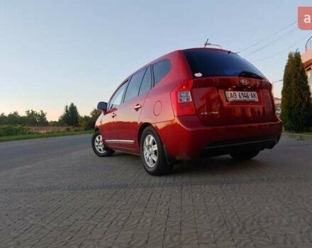 Червоний Кіа Каренс, об'ємом двигуна 2 л та пробігом 175 тис. км за 6000 $, фото 1 на Automoto.ua