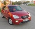 Червоний Кіа Каренс, об'ємом двигуна 2 л та пробігом 175 тис. км за 6000 $, фото 2 на Automoto.ua