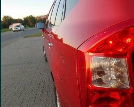 Червоний Кіа Каренс, об'ємом двигуна 2 л та пробігом 175 тис. км за 6000 $, фото 4 на Automoto.ua