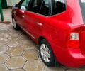 Червоний Кіа Каренс, об'ємом двигуна 2 л та пробігом 260 тис. км за 5800 $, фото 19 на Automoto.ua
