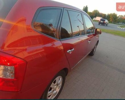 Червоний Кіа Каренс, об'ємом двигуна 2 л та пробігом 175 тис. км за 6000 $, фото 3 на Automoto.ua