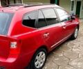 Червоний Кіа Каренс, об'ємом двигуна 2 л та пробігом 260 тис. км за 5800 $, фото 16 на Automoto.ua