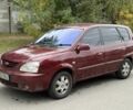 Красный Киа Каренс, объемом двигателя 0 л и пробегом 200 тыс. км за 1600 $, фото 1 на Automoto.ua