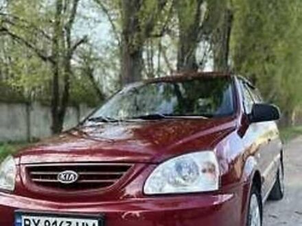 Красный Киа Каренс, объемом двигателя 2 л и пробегом 319 тыс. км за 4500 $, фото 1 на Automoto.ua