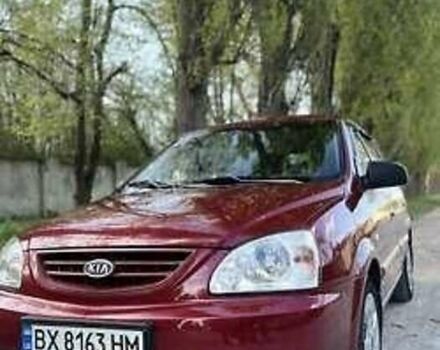 Красный Киа Каренс, объемом двигателя 2 л и пробегом 319 тыс. км за 4500 $, фото 1 на Automoto.ua