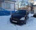 Кіа Каренс, об'ємом двигуна 2 л та пробігом 249 тис. км за 7950 $, фото 19 на Automoto.ua