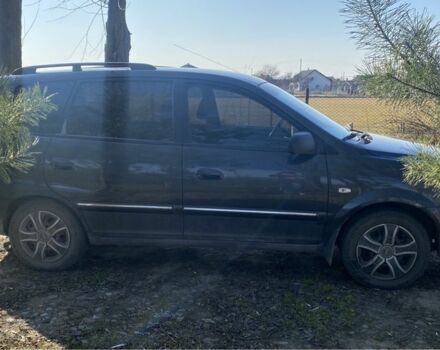 Серый Киа Каренс, объемом двигателя 1.6 л и пробегом 231 тыс. км за 3000 $, фото 2 на Automoto.ua