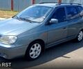 Серый Киа Каренс, объемом двигателя 1.8 л и пробегом 285 тыс. км за 2400 $, фото 1 на Automoto.ua