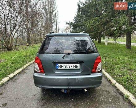 Серый Киа Каренс, объемом двигателя 1.8 л и пробегом 248 тыс. км за 1800 $, фото 4 на Automoto.ua