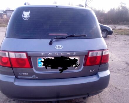 Сірий Кіа Каренс, об'ємом двигуна 2 л та пробігом 270 тис. км за 4200 $, фото 1 на Automoto.ua