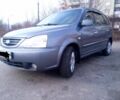 Сірий Кіа Каренс, об'ємом двигуна 2 л та пробігом 270 тис. км за 4200 $, фото 2 на Automoto.ua