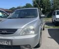 Сірий Кіа Каренс, об'ємом двигуна 2 л та пробігом 250 тис. км за 1950 $, фото 1 на Automoto.ua