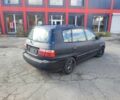 Серый Киа Каренс, объемом двигателя 2 л и пробегом 250 тыс. км за 1200 $, фото 6 на Automoto.ua