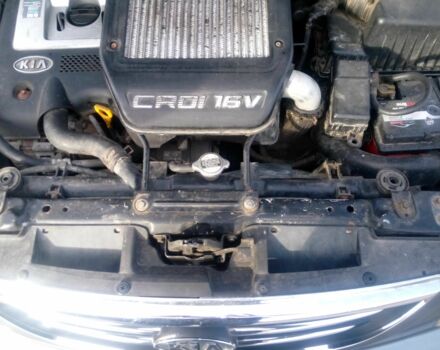 Сірий Кіа Каренс, об'ємом двигуна 2 л та пробігом 270 тис. км за 4200 $, фото 4 на Automoto.ua