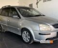 Серый Киа Каренс, объемом двигателя 2 л и пробегом 391 тыс. км за 3800 $, фото 1 на Automoto.ua