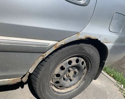 Серый Киа Каренс, объемом двигателя 2 л и пробегом 250 тыс. км за 834 $, фото 5 на Automoto.ua