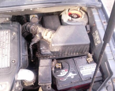 Сірий Кіа Каренс, об'ємом двигуна 2 л та пробігом 270 тис. км за 4200 $, фото 5 на Automoto.ua