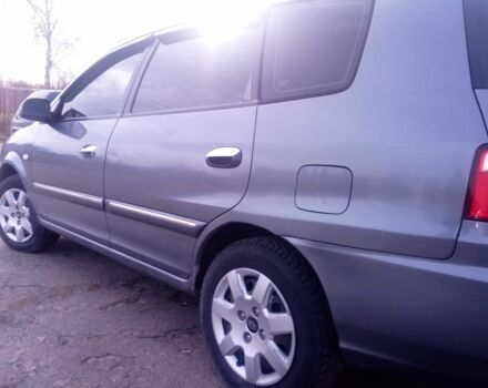 Сірий Кіа Каренс, об'ємом двигуна 2 л та пробігом 270 тис. км за 4200 $, фото 9 на Automoto.ua