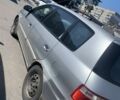Серый Киа Каренс, объемом двигателя 2 л и пробегом 250 тыс. км за 1950 $, фото 1 на Automoto.ua