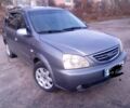 Сірий Кіа Каренс, об'ємом двигуна 2 л та пробігом 270 тис. км за 4200 $, фото 3 на Automoto.ua